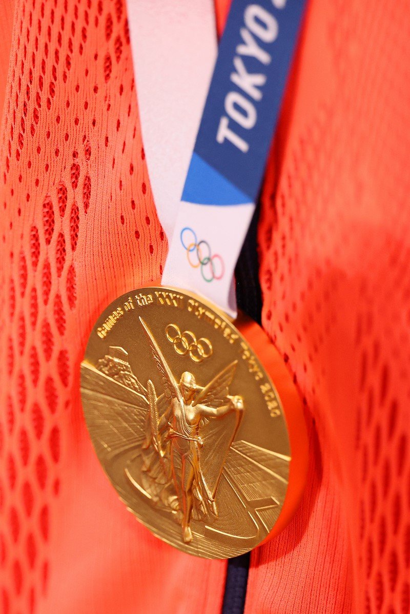 Отчего организаторы Олимпиады советуют спортсменам не кусать медали